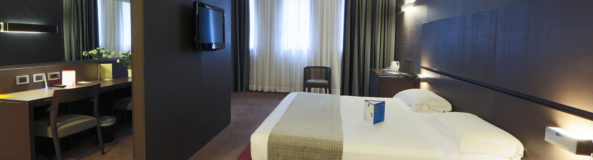 Scopri le camere family dotate di ogni comfort del nostro hotel 4 stelle a due passi da Milano.
